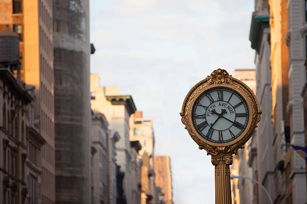 istock Clock on 5th Ave. in New York City 516162411