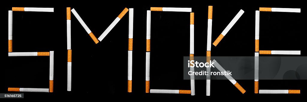 text Smoke made from cigarettes text Smoke made from cigarettes on dark background Addiction Stock Photo