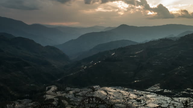 Landscapes on mountain and rice terrace with ray light in China