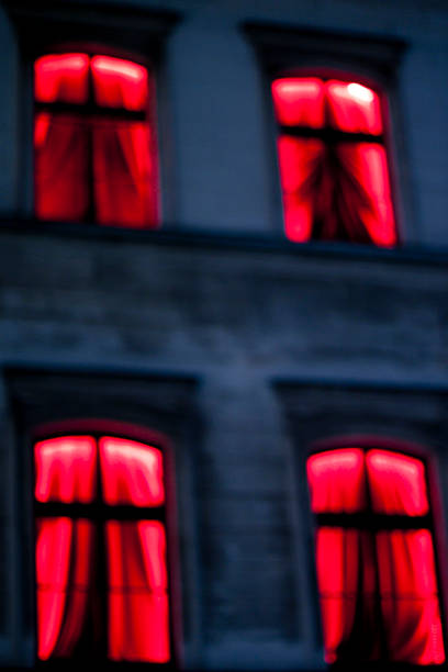 istock Defocused red window in the house 516173930