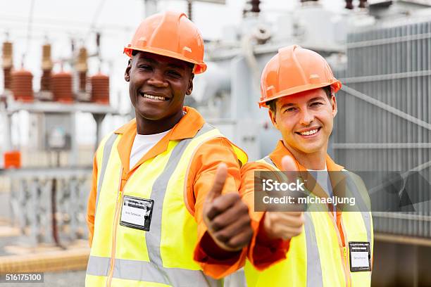 Electricians Giving Thumb Up In Substation Stock Photo - Download Image Now - Adult, African Ethnicity, African-American Ethnicity