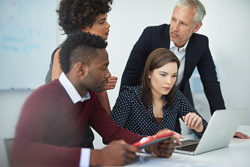Getting Job Done Getting The Job Done With Teamwork Stock Photo - Download Image Now ...