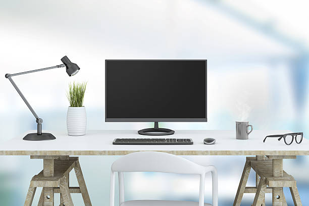 istock Large PC monitor on a business background 516181384