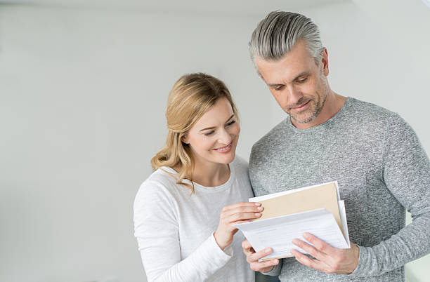 istock Couple at home getting the mail 516184510