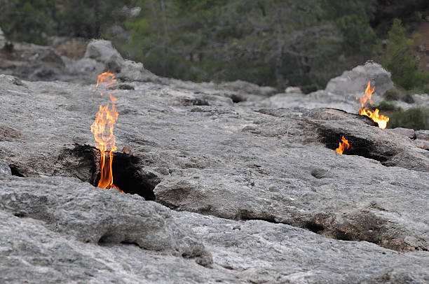 fires on Mount Chimera Flaming rock (Yanartas ) in  Antalya, Turkey is generally believed to be the ancient Mount Chimera. The wonder-fires have been burning for at least 2500 years. cirali stock pictures, royalty-free photos & images