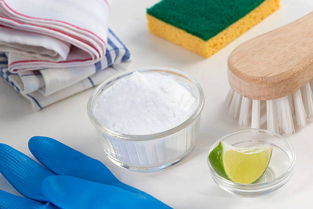 Eco-friendly natural cleaners Vinegar, baking soda, salt, lemon stock photo