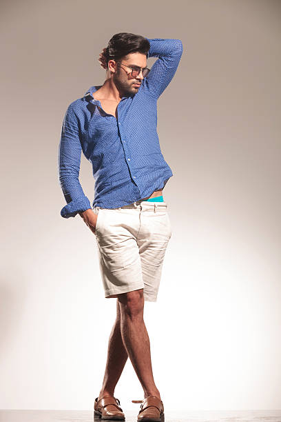 istock handsome young fashion man standing 516188894
