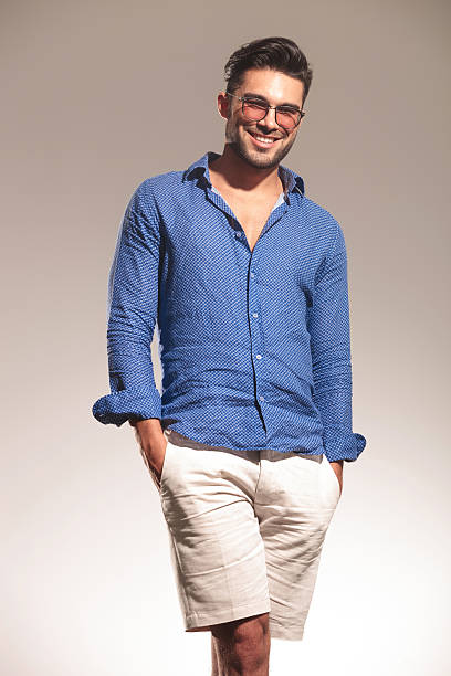 istock handsome young fashion man smiling 516188986