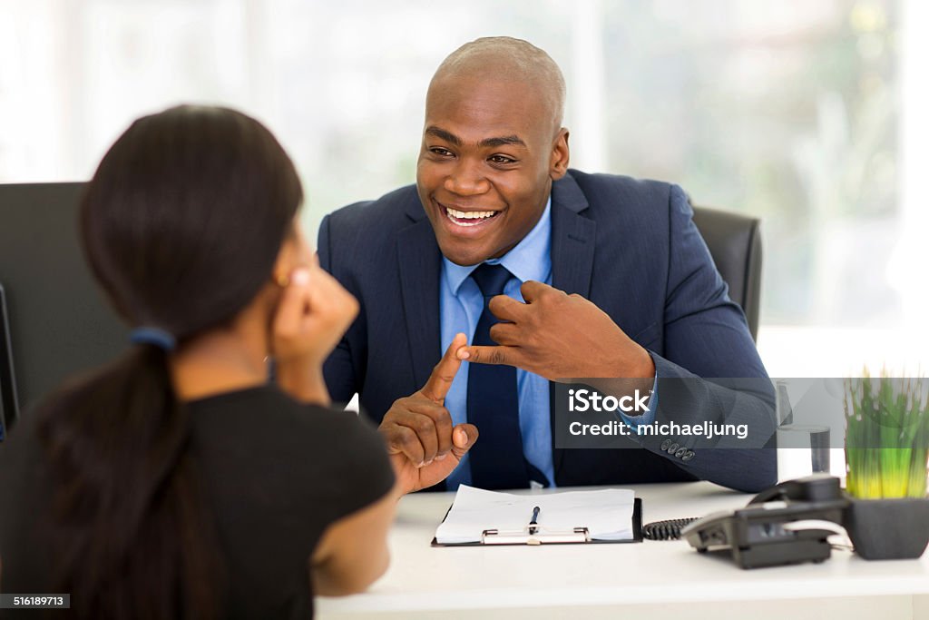 african american businessman meeting with client friendly african american businessman meeting with client African-American Ethnicity Stock Photo