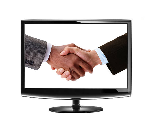 istock handshake in LCD monitor 516194771