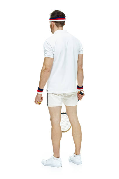 istock Rear view of tennis player standing 516209306