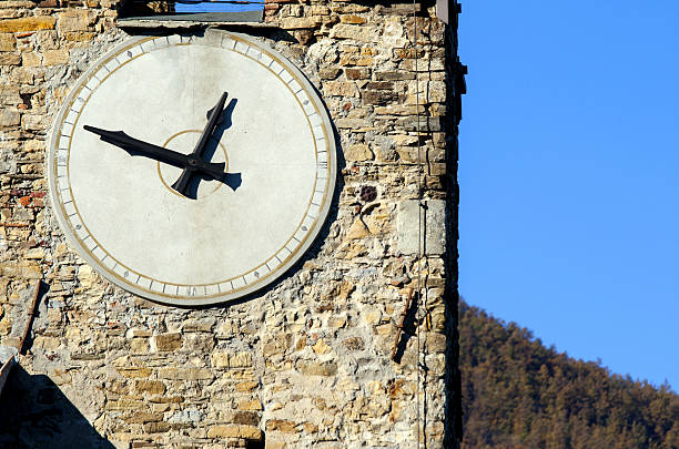 Old clock tower in Parma medieval town.