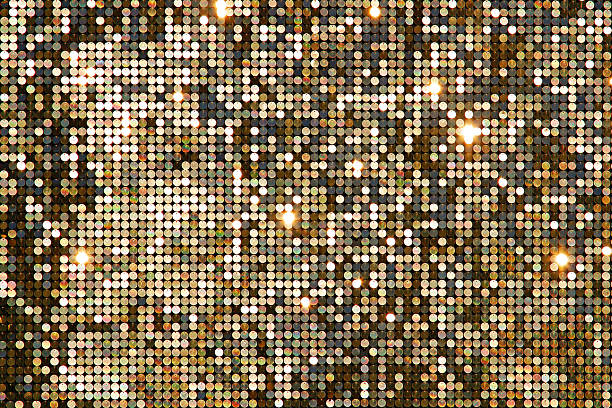 istock Golden background mosaic with light spots 516210366