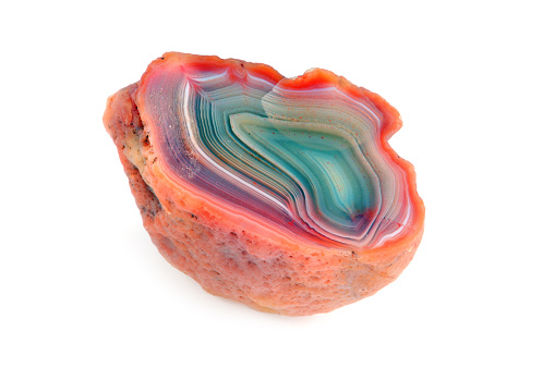 Agate in orange, green, red isolated on white background.