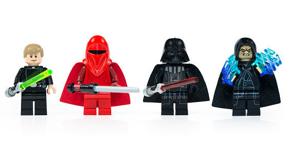 Muenster, Germany - March 8th 2015: A group of five various Lego Star Wars mini characters isolated on white.  Lego is a popular line of construction toys manufactured by the Lego Group.