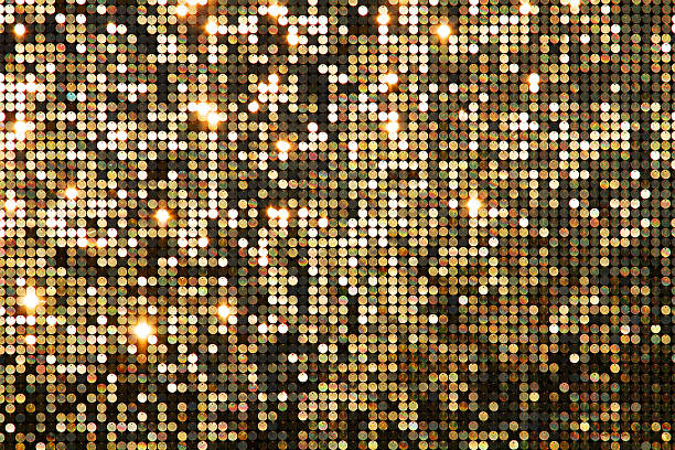 istock Golden background mosaic with light spots 516212102