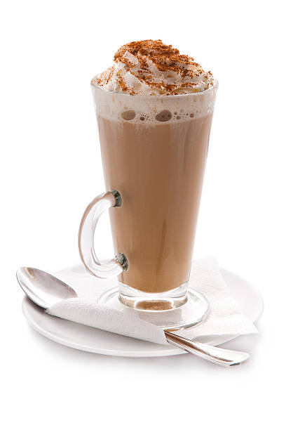 istock Glass cup of hot coffee with cream and cinnamon 516212926