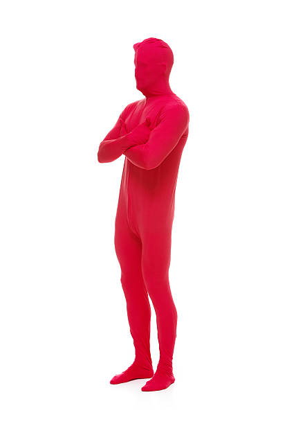 istock Man in halloween costume standing with arms crossed 516214149