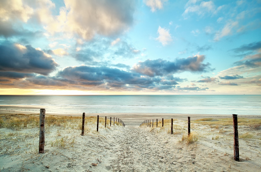 sand way to the North sea beach and beautiful sky, Holland