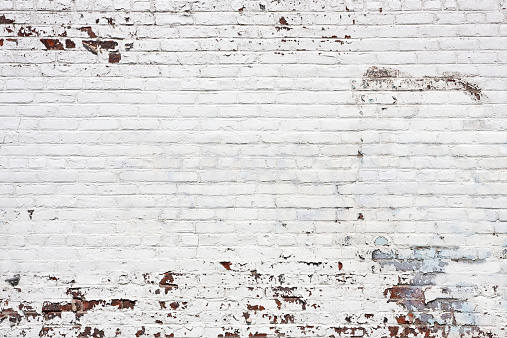 Front view of old white brick wall texture. 