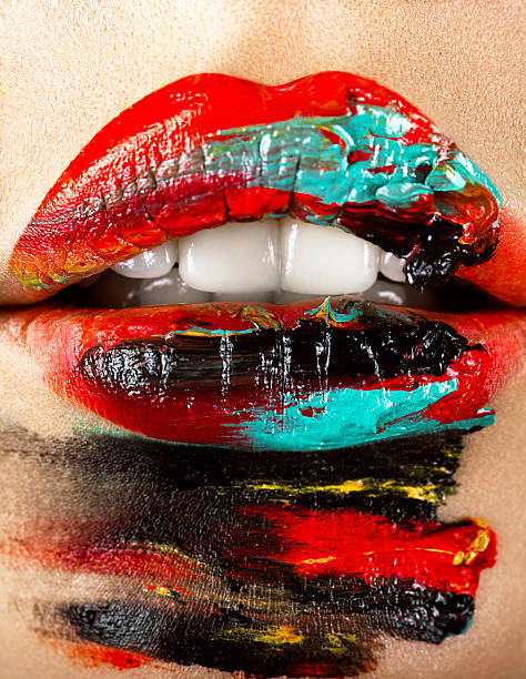 istock Colorful make-up lips close up. Art beauty image 516215576