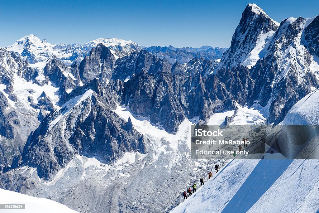 Climber on the way to the top of Mont Blanc Chamonix, France - September 2, 2014: Climbers climbing mont blanc in france the way to the summit. Leadership Stock Photo