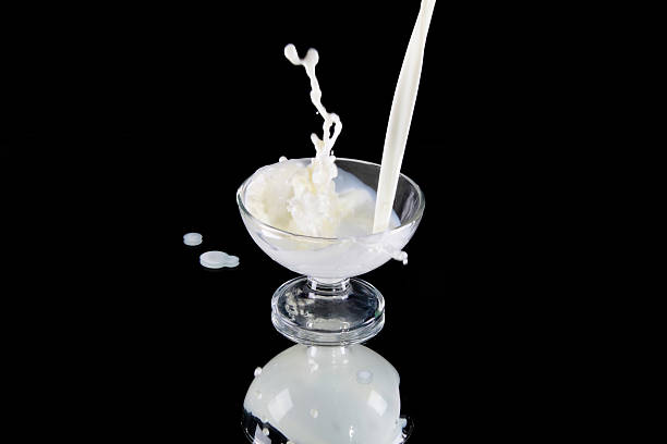 istock Splash in a milk glass 516216799