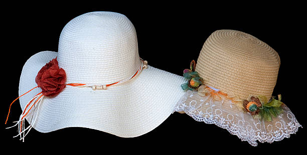 istock Old style ladies hats, One is white red rose ribbo 516216819