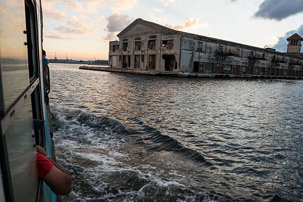 Havana, Cuba - December 17, 2014: A ferry transports passengers across Havana Harbor from Casablanca to the Muelle Luz terminal in Habana Vieja.