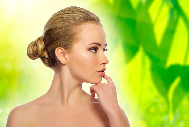 istock Healthy girl on floral spring background 516220284