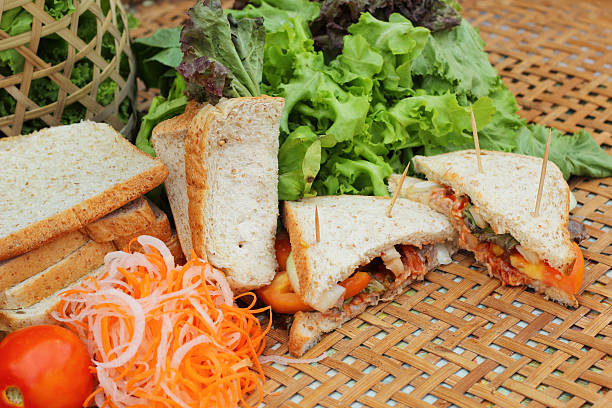istock making tuna sandwich with fresh vegetables 516228475