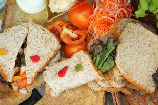 istock making tuna sandwich with fresh vegetables 516228499
