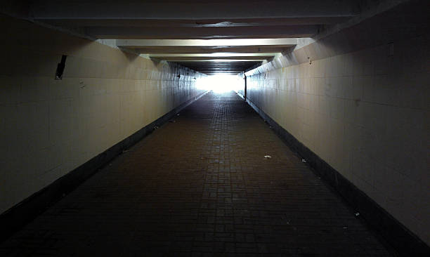 istock Light at the end of the tunnel. 516229181