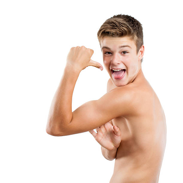 Muscular teenager looking angry.