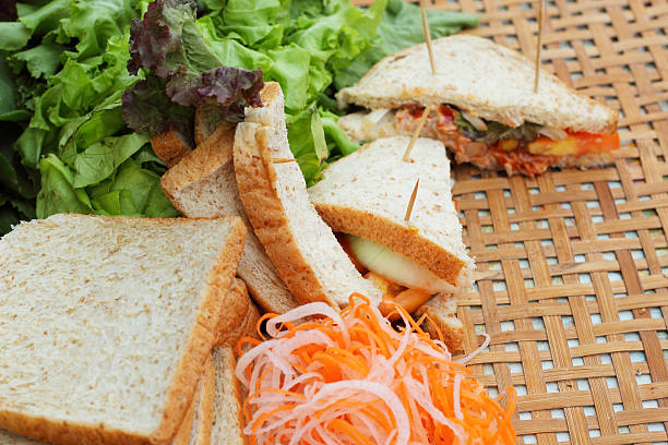 istock making tuna sandwich with fresh vegetables 516229823