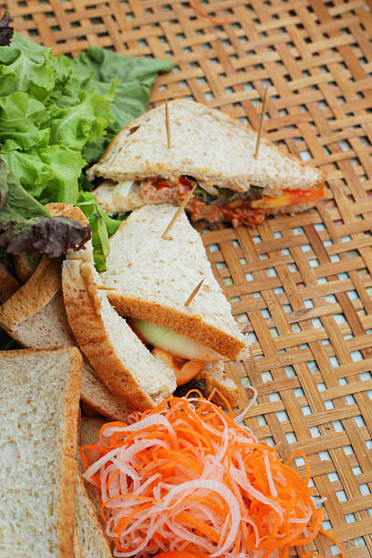 istock making tuna sandwich with fresh vegetables 516229827