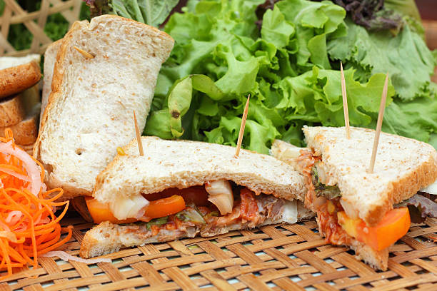 istock making tuna sandwich with fresh vegetables 516230379