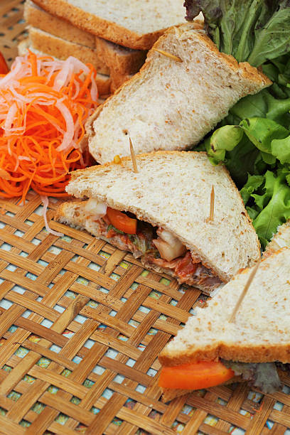 istock making tuna sandwich with fresh vegetables 516230387