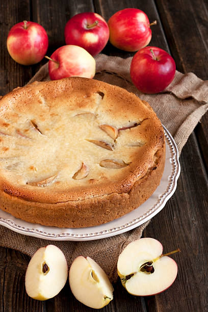 istock Apple pie on the wooden table with fresh apples 516231631