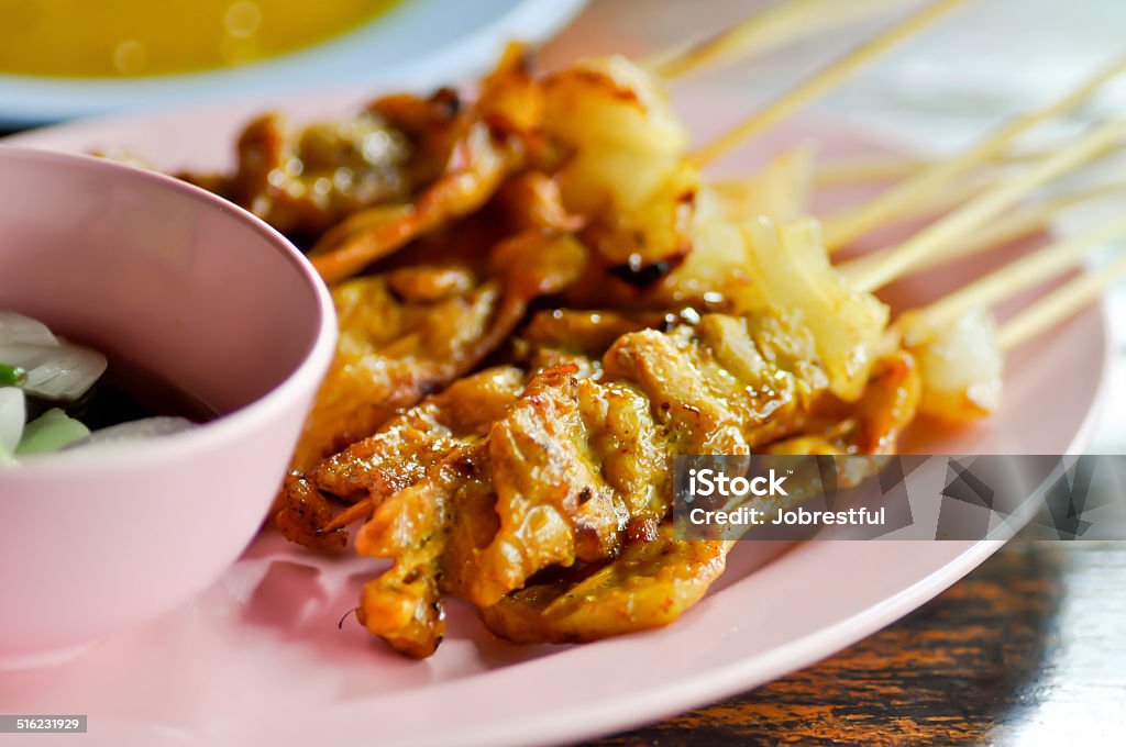 pork satay dish pork satay dish with dip Adulation Stock Photo