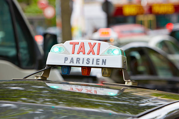 istock Parisian taxi sign in Paris 516233843