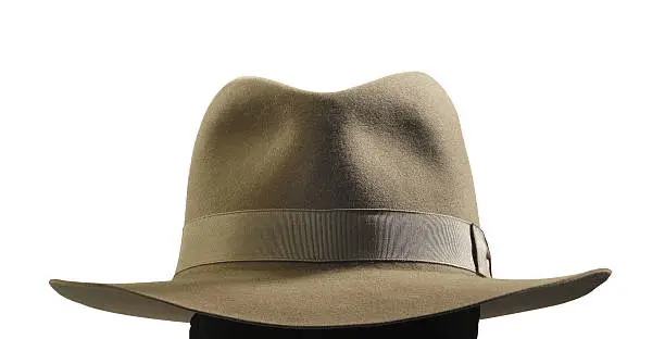 beige cloth hat isolated on white background, used by Indiana Jones