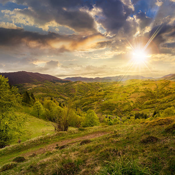 istock field near home in mountains at sunset 516234757