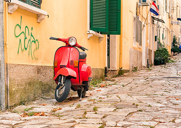 istock Red scooter on street, Greece 516235427