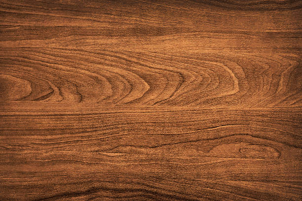 istock Brown Wooden Desk Background 516239418