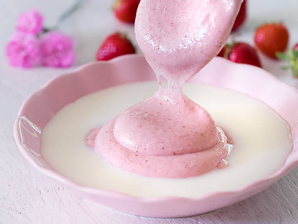 istock Delicious berry mousse with milk, strawberry and carnations 516240026
