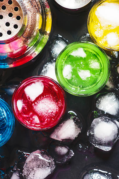 Cocktails with ice on a dark background