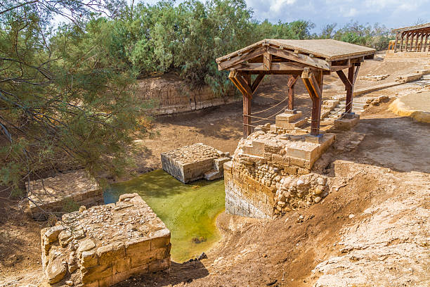 istock The site where Jeasus was baptized in river Jordan 516243322