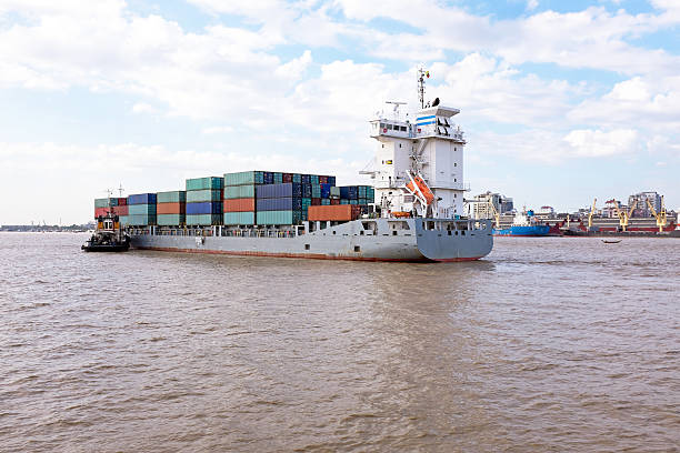 istock Containership on the Yangon river near Yangon in Myanmar 516243984