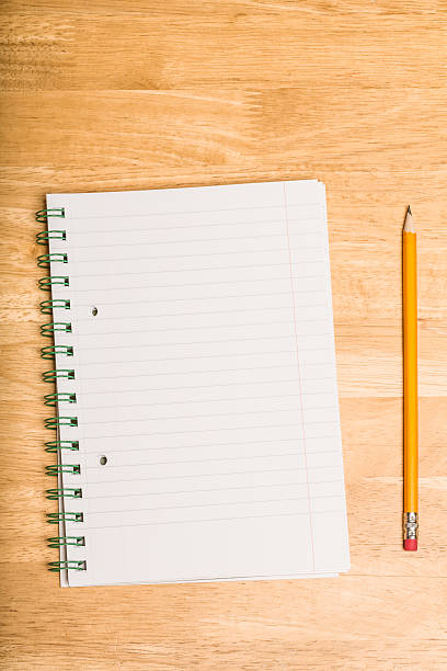 istock Overhead shot of pupils desk 516246825